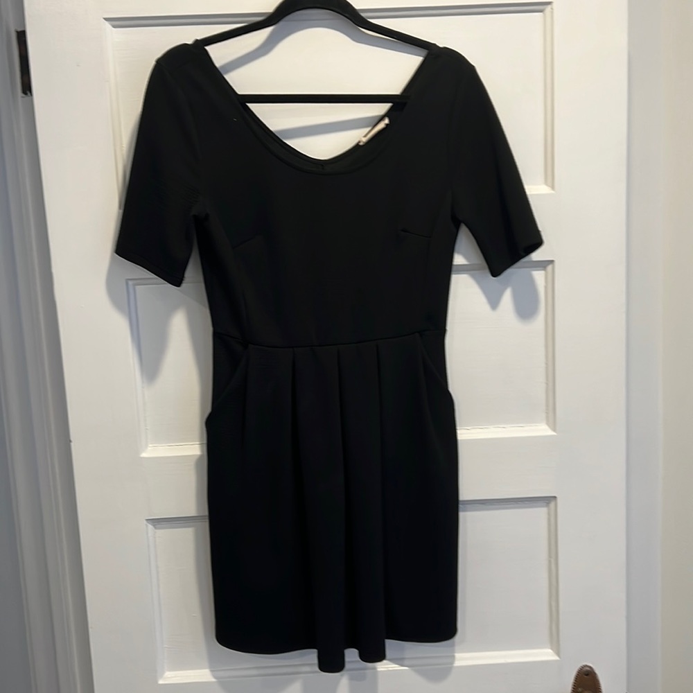 Lush black dress with pockets